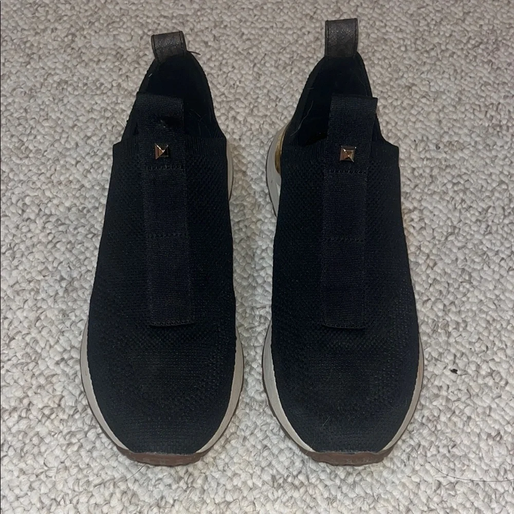 Michael Kors Black Slip-On Sneakers with Gold Trim and Studs